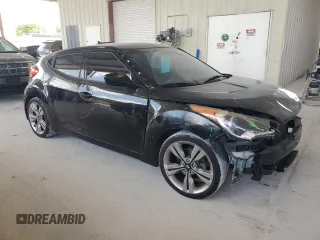 2013 Hyundai Veloster w/Gray Int z VIN KMHTC6AD8DU163465, wystawiony jako Copart lot #60276915 z przebiegiem 124 451 mil mil oraz Szkoda całkowita • Salvage title. Historia ofert i sprzedaży dostępna na DreamBid. Obrazek 4.