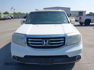 2015 Honda Pilot EX-L with VIN 5FNYF4H56FB061663, listed as a IAAI auction lot 41873152 with 211,876 mi miles and . Bid and sale history available at carsss.com. Image 12.