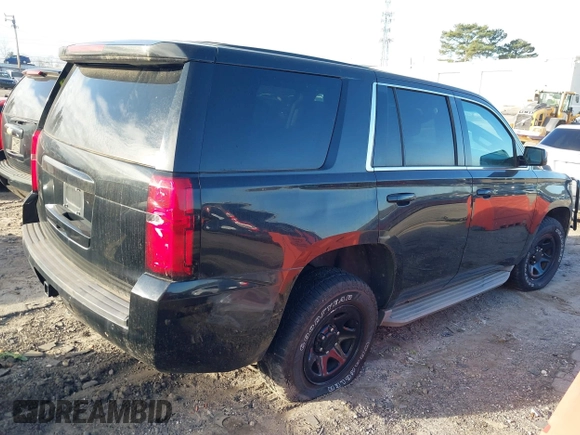 2015 Chevrolet Tahoe Commercial z VIN 1GNLC2EC4FR535329, wystawiony jako IAAI lot #41643486 z przebiegiem 185 326 mil mil oraz . Historia ofert i sprzedaży dostępna na DreamBid. Obrazek 4.
