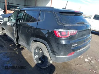 2019 Jeep Compass Latitude with VIN 3C4NJDBB1KT648185, listed as a IAAI auction lot 41622077 with 74,072 mi miles and . Bid and sale history available at DreamBid. Image 3.