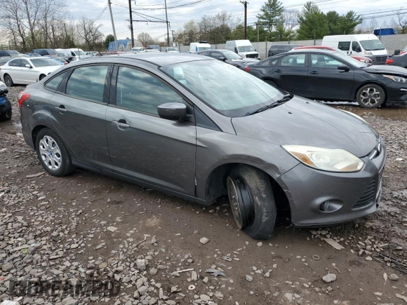 2012 Ford Focus SE with VIN 1FAHP3F25CL168038, listed as a Copart auction lot 51965405 with 80,843 mi miles and Salvage Title. Bid and sale history available at DreamBid. Image 4.