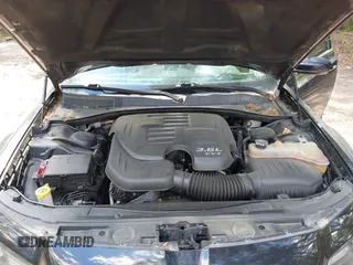 2015 Chrysler 300 with VIN 2C3CCABGXFH763155, listed as a IAAI auction lot 42213899 with 102,479 mi miles. Bid and sale history available at carsss.com. Image 10.