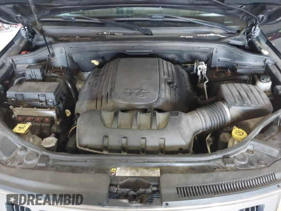 2012 Jeep Grand Cherokee Laredo with VIN 1C4RJFAT8CC182128, listed as a IAAI auction lot 40154044 with 239,601 mi miles. Bid and sale history available at carsss.com. Image 10.