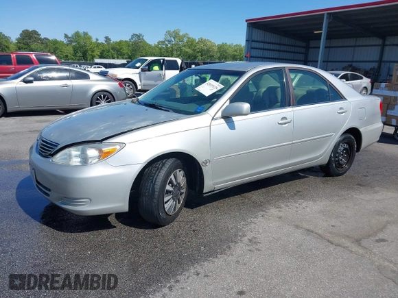 2004 Toyota Camry LE with VIN 4T1BE32K04U319290, listed as a IAAI auction lot 42019125 with 304,666 mi miles. Bid and sale history available at carsss.com. Image 2.