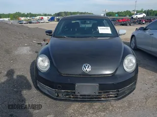 2013 Volkswagen Beetle 2.5L with VIN 3VWJP7AT1DM608370, listed as a IAAI auction lot 42088900 with Not Provided miles and . Bid and sale history available at DreamBid. Image 12.