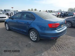 2015 Volkswagen Jetta Sedan 1.8T SE with VIN 3VWD17AJ0FM284070, listed as a IAAI auction lot 41853883 with 194,725 mi miles. Bid and sale history available at carsss.com. Image 3.