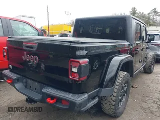 2021 Jeep Gladiator Rubicon z VIN 1C6JJTBG8ML524215, wystawiony jako IAAI lot #41829990 z przebiegiem 62 942 mil mil oraz . Historia ofert i sprzedaży dostępna na DreamBid. Obrazek 4.
