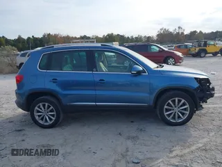 2017 Volkswagen Tiguan Wolfsburg Edition with VIN WVGRV7AX6HW504313, listed as a IAAI auction lot 40950812 with 149,884 mi miles and . Bid and sale history available at DreamBid. Image 13.