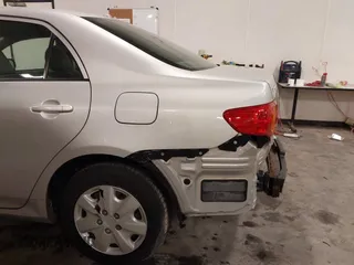 2009 Toyota Corolla with VIN 1NXBU40E69Z129314, listed as a IAAI auction lot 41718098 with 170,739 mi miles. Bid and sale history available at carsss.com. Image 6.