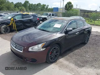 2012 Nissan Maxima SV with VIN 1N4AA5AP7CC814410, listed as a IAAI auction lot 42636484 with 144,363 mi miles and . Bid and sale history available at DreamBid. Image 2.