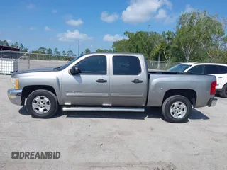 2013 Chevrolet Silverado 1500 LT with VIN 3GCPCSE01DG206827, listed as a IAAI auction lot 41976945 with 213,940 mi miles and . Bid and sale history available at DreamBid. Image 15.