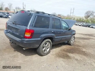 2004 Jeep Grand Cherokee Limited with VIN 1J8GW58N44C274714, listed as a IAAI auction lot 41922819 with 204,251 mi miles. Bid and sale history available at carsss.com. Image 4.