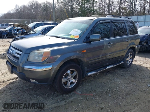 2007 Honda Pilot EX-L with VIN 5FNYF28737B001928, listed as a IAAI auction lot 41311134 with 243,870 mi miles. Bid and sale history available at carsss.com. Image 2.