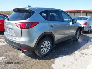 2013 Mazda CX-5 Touring with VIN JM3KE2CE6D0164430, listed as a IAAI auction lot 41961655 with 194,278 mi miles. Bid and sale history available at carsss.com. Image 4.