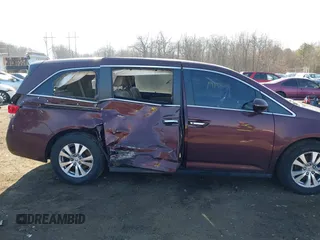 2014 Honda Odyssey EX-L with VIN 5FNRL5H60EB009083, listed as a IAAI auction lot 41633419 with 219,930 mi miles and . Bid and sale history available at carsss.com. Image 18.