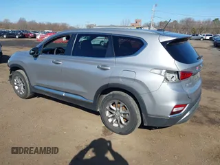 2020 Hyundai Santa Fe SE z VIN 5NMS2CAD7LH269302, wystawiony jako IAAI lot #41833303 z przebiegiem 70 665 mil mil oraz . Historia ofert i sprzedaży dostępna na DreamBid. Obrazek 3.