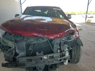 2021 Jeep Grand Cherokee 80th Anniversary with VIN 1C4RJFBG3MC631086, listed as a Copart auction lot 57304375 with 57,872 mi miles and Salvage title. Bid and sale history available at DreamBid. Image 14.