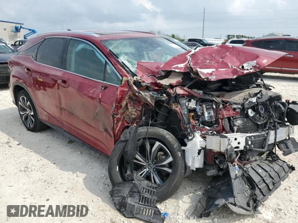 2022 Lexus RX 450h with VIN 2T2HGMDA8NC076504, listed as a Copart auction lot 51940915 with 39,050 mi miles and Salvage title. Bid and sale history available at DreamBid. Image 4.