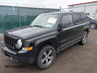 2016 Jeep Patriot Latitude with VIN 1C4NJRFB1GD523904, listed as a IAAI auction lot 42017736 with 164,705 mi miles. Bid and sale history available at carsss.com. Image 2.