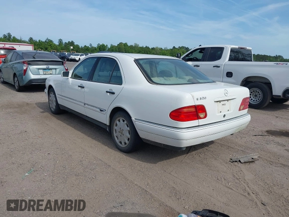 1998 Mercedes-Benz E-Class with VIN WDBJF65FXWA615255, listed as a IAAI auction lot 42146962 with 219,710 mi miles. Bid and sale history available at carsss.com. Image 3.