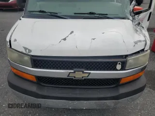 2012 Chevrolet Express Passenger 1LT z VIN 1GAZG1FG9C1143775, wystawiony jako Copart lot #58383685 z przebiegiem Nie podano mil oraz Szkody całkowita. Historia ofert i sprzedaży dostępna na DreamBid. Obrazek 12.