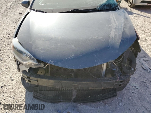 2014 Toyota Corolla L z VIN 2T1BURHE6EC132128, wystawiony jako Copart lot #47406795 z przebiegiem 163 798 mil mil oraz Szkoda całkowita • Salvage title. Historia ofert i sprzedaży dostępna na DreamBid. Obrazek 11.