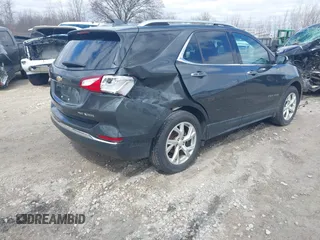 2018 Chevrolet Equinox Premier with VIN 2GNAXVEVXJ6188205, listed as a IAAI auction lot 42028868 with 93,828 mi miles and . Bid and sale history available at DreamBid. Image 4.