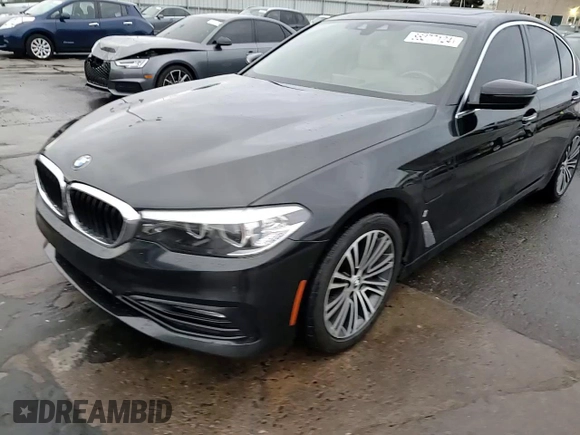 2018 BMW 5 Series 530e xDrive with VIN WBAJB1C5XJB084018, listed as a Copart auction lot 86277124 with 127,517 mi miles and Salvage Title. Bid and sale history available at carsss.com. Image 14.