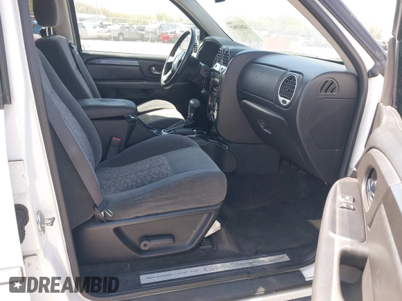 2006 GMC Envoy SLE with VIN 1GKDT13SX62258586, listed as a IAAI auction lot 42045967 with 143,225 mi miles. Bid and sale history available at carsss.com. Image 5.
