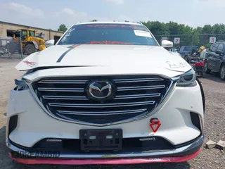 2020 Mazda CX-9 Grand Touring with VIN JM3TCBDY3L0410674, listed as a IAAI auction lot 42389157 with 130,519 mi miles and . Bid and sale history available at DreamBid. Image 12.