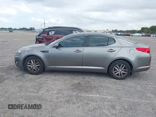 2013 Kia Optima LX z VIN 5XXGM4A74DG147688, wystawiony jako IAAI lot #42127503 z przebiegiem 148 705 mil mil oraz . Historia ofert i sprzedaży dostępna na DreamBid. Obrazek 14.