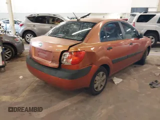 2009 Kia Rio LX with VIN KNADE223796547229, listed as a IAAI auction lot 41947371 with 153,061 mi miles and . Bid and sale history available at DreamBid. Image 4.