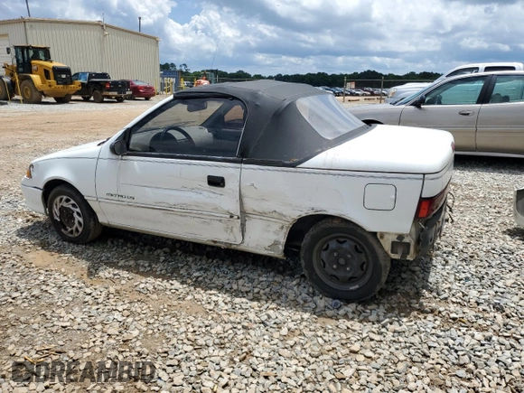 1993 Geo Metro z VIN JG1MR3362PK209644, wystawiony jako Copart lot #58749655 z przebiegiem 149 163 mil mil oraz Szkoda całkowita • Salvage title. Historia ofert i sprzedaży dostępna na DreamBid. Obrazek 2.