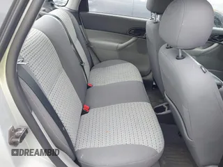 2007 Ford Focus S z VIN 1FAHP34NX7W358354, wystawiony jako IAAI lot #42242364 z przebiegiem 48 900 mil mil oraz . Historia ofert i sprzedaży dostępna na DreamBid. Obrazek 8.