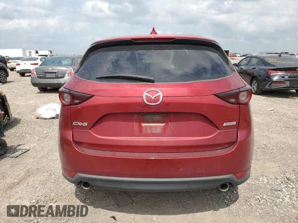 2018 Mazda CX-5 Touring with VIN JM3KFACM8J1469772, listed as a Copart auction lot 54863415 with 97,592 mi miles and Salvage Title. Bid and sale history available at carsss.com. Image 6.