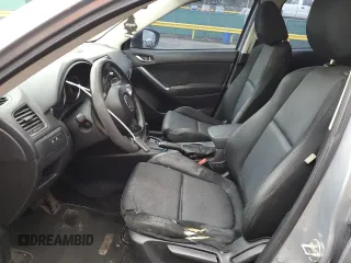 2013 Mazda CX-5 Sport z VIN JM3KE4BE4D0147672, wystawiony jako Copart lot #61617215 z przebiegiem 264 421 mil mil oraz Czysty tytuł • Clean title. Historia ofert i sprzedaży dostępna na DreamBid. Obrazek 7.