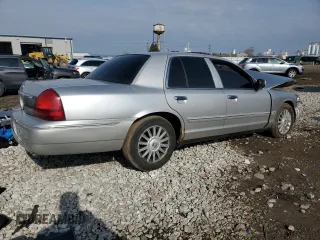 2010 Mercury Grand Marquis LS z VIN 2MEBM7FV4AX636897, wystawiony jako Copart lot #53387985 z przebiegiem Nie podano mil oraz Szkody całkowita. Historia ofert i sprzedaży dostępna na DreamBid. Obrazek 3.