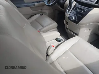 2013 Honda Odyssey EX-L with VIN 5FNRL5H65DB064238, listed as a IAAI auction lot 42050743 with 189,437 mi miles and . Bid and sale history available at carsss.com. Image 5.