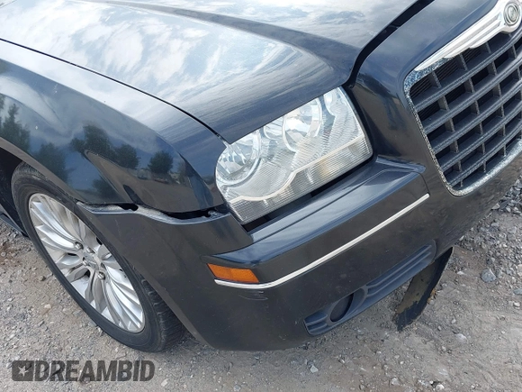 2006 Chrysler 300 Touring with VIN 2C3KA53G36H220558, listed as a IAAI auction lot 42159373 with 158,970 mi miles. Bid and sale history available at carsss.com. Image 12.