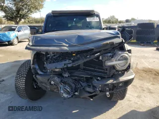 2022 Ford Bronco with VIN 1FMEE5DH1NLB82717, listed as a Copart auction lot 83230614 with 21,593 mi miles and Salvage Title. Bid and sale history available at DreamBid. Image 5.