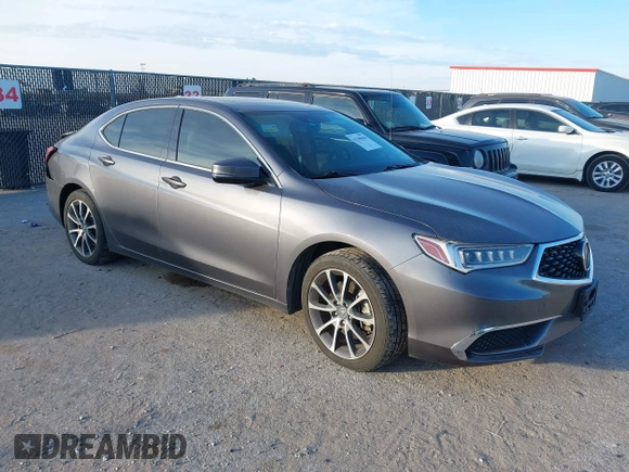 2018 Acura TLX with VIN 19UUB2F34JA008883, listed as a IAAI auction lot 41386586 with 57,928 mi miles. Bid and sale history available at carsss.com. Image 1.