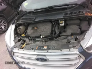 2018 Ford Escape SE z VIN 1FMCU9GD9JUC13422, wystawiony jako IAAI lot #42350179 z przebiegiem 113 822 mil mil oraz . Historia ofert i sprzedaży dostępna na DreamBid. Obrazek 1.