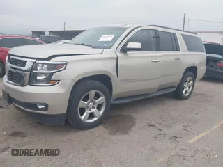 2015 Chevrolet Suburban LT with VIN 1GNSCJKC4FR744208, listed as a IAAI auction lot 41612915 with 87,445 mi miles and . Bid and sale history available at DreamBid. Image 2.