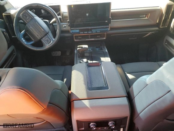 2024 GMC HUMMER EV SUV 3X with VIN 1GKB0RDC6RU103340, listed as a Copart auction lot 79773874 with NaN miles and Salvage Title. Bid and sale history available at carsss.com. Image 8.