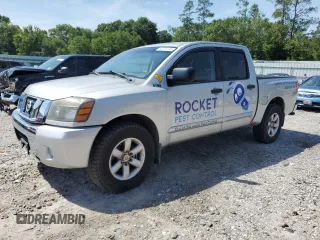 2012 Nissan Titan SL z VIN 1N6BA0ED0CN320988, wystawiony jako Copart lot #60226195 z przebiegiem 239 662 mil mil oraz Czysty tytuł • Clean title. Historia ofert i sprzedaży dostępna na DreamBid. Obrazek 1.