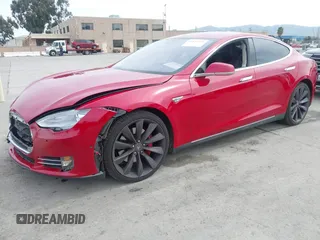 2015 Tesla Model S 85D with VIN 5YJSA1H42FF086599, listed as a IAAI auction lot 41832223 with 67,671 mi miles. Bid and sale history available at carsss.com. Image 19.