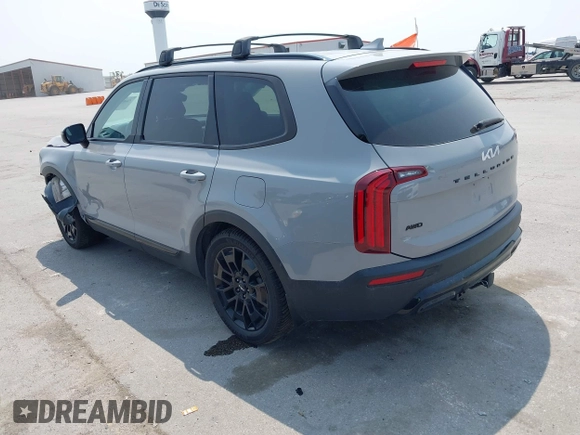 2022 Kia Telluride SX z VIN 5XYP5DHC7NG262332, wystawiony jako IAAI lot #42400373 z przebiegiem 47 580 mil mil oraz . Historia ofert i sprzedaży dostępna na DreamBid. Obrazek 3.