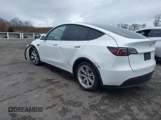 2023 Tesla Model Y Long Range with VIN 7SAYGDEEXPF684287, listed as a IAAI auction lot 41961230 with 45,080 mi miles and . Bid and sale history available at carsss.com. Image 3.