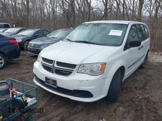 2014 Dodge Grand Caravan SE with VIN 2C4RDGBG9ER283848, listed as a IAAI auction lot 41666021 with 120,351 mi miles and . Bid and sale history available at DreamBid. Image 2.