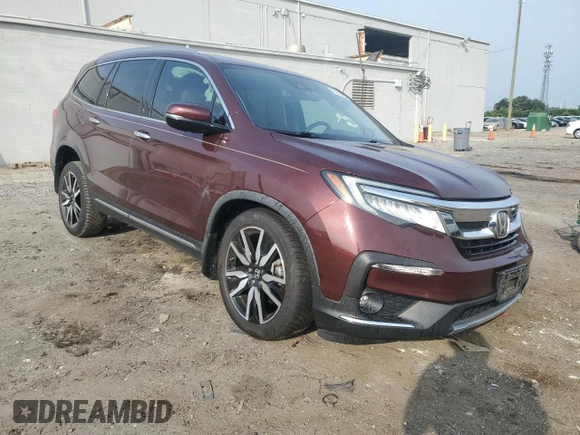 2020 Honda Pilot Touring 8-Passenger with VIN 5FNYF6H96LB028737, listed as a Copart auction lot 60435635 with 115,023 mi miles and Salvage title. Bid and sale history available at DreamBid. Image 4.